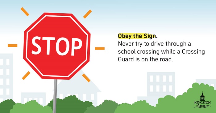 KingstonPolice's tweet photo. Did you know that disobeying a Crossing Guard's STOP sign can result in a $1000 fine and 4 demerit points? Never try to drive through a school crossing while a Crossing Guard is still on the road with their STOP sign displayed. #ygk #TrafficSafety https://t.co/5GYYKoIYdb