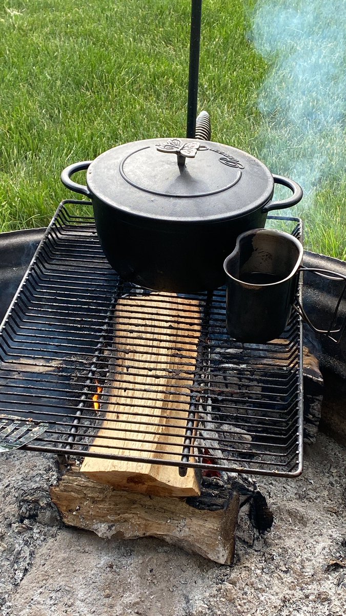Canteen cup of coffee and some eggs and sausage in the cast iron! Hello summertime!!