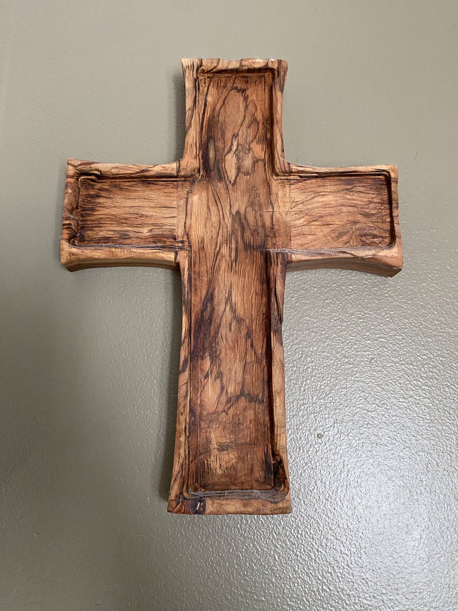 Nookgeek's tweet photo. I asked a local artist to carve a cross out of Olive wood. He ordered the wood from Israel and this is the cross he craved from the wood. Do you see what I see? #marymotherofjesus https://t.co/tfzjOUsrCC
