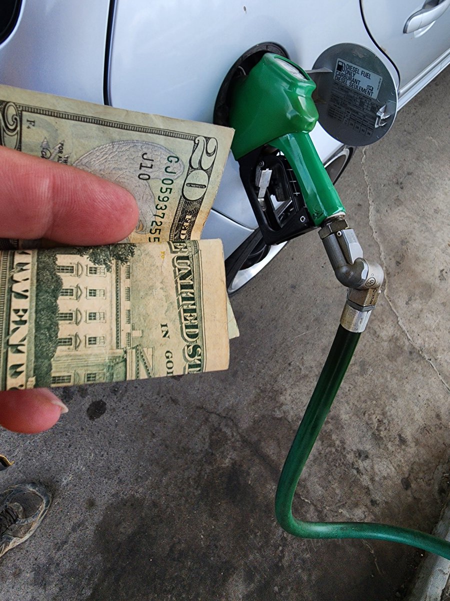 Had finished picking up parts for grandfather's old truck. Had to wait at gas station as there was only one diesel pump with guy parked by it. Went in to pay and found a 20 tucked in my gas flap, an apology?