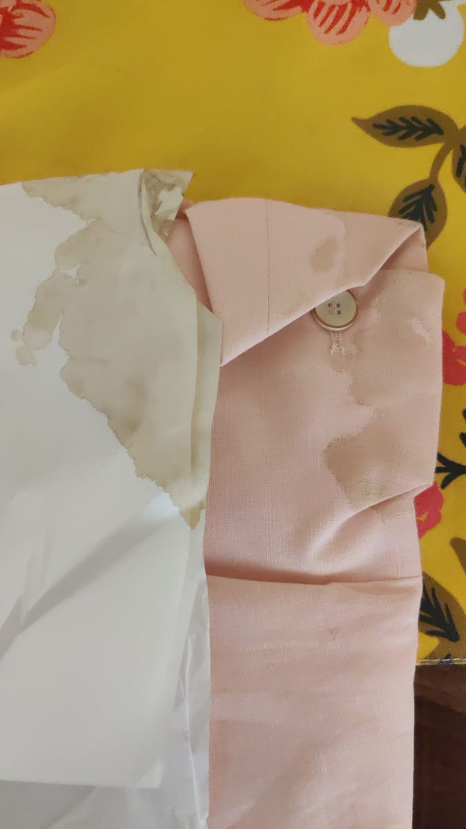 sharshkk's tweet photo. @ZARA_Care This is how I received my online order. You sent me a dress with a big coffee stain. Now you are not giving me my refund, stating that I ruined the piece. What is wrong with your customer service? https://t.co/osXGQ84B7Q