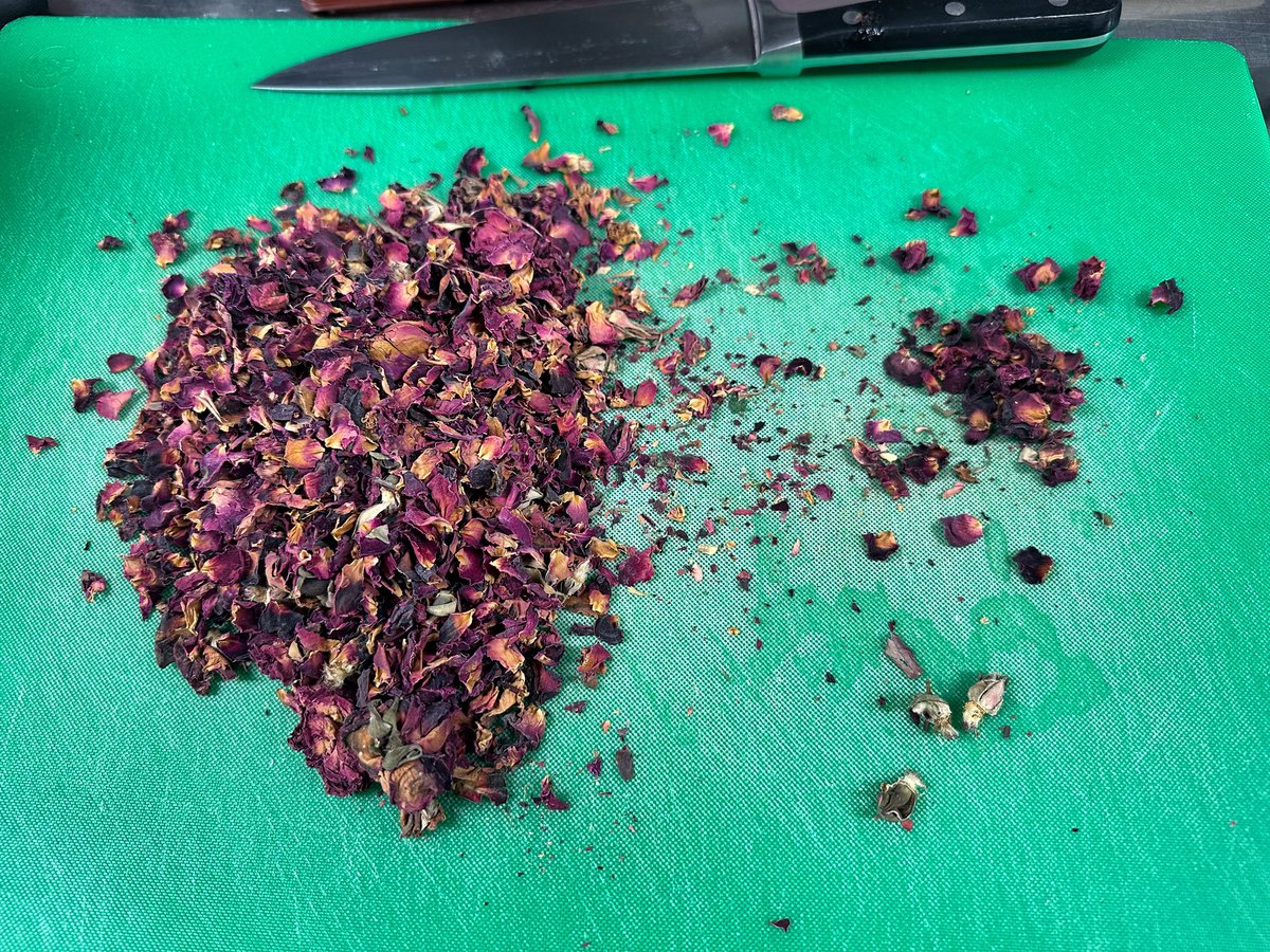 twidleybits's tweet photo. Well, if it isn’t one of my least favorite tasks! I love the quality of these rose petals but the labor is pesky. I need to separate the buds &amp; petals from the hips, sepals, and stems. Those don’t make delicious raspberry rose rosé jam so they gotta go! At least it smells lovely https://t.co/X4DzQ2z3id