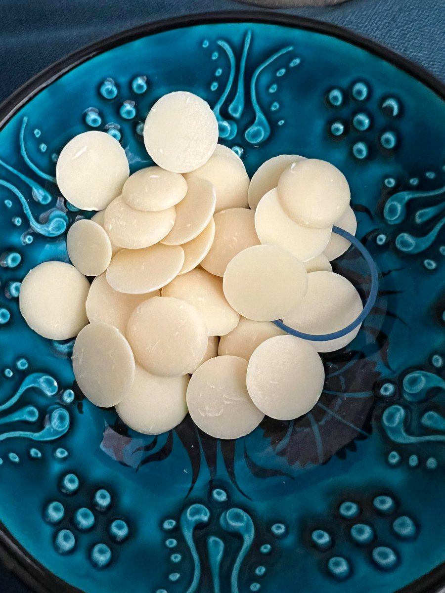 TommyR_'s tweet photo. @AldiUK my pregnant wife just opened a bag of your white milk chocolate buttons and almost choked on this which came from the bag. Really not happy at all! https://t.co/M6lMmhEMz7