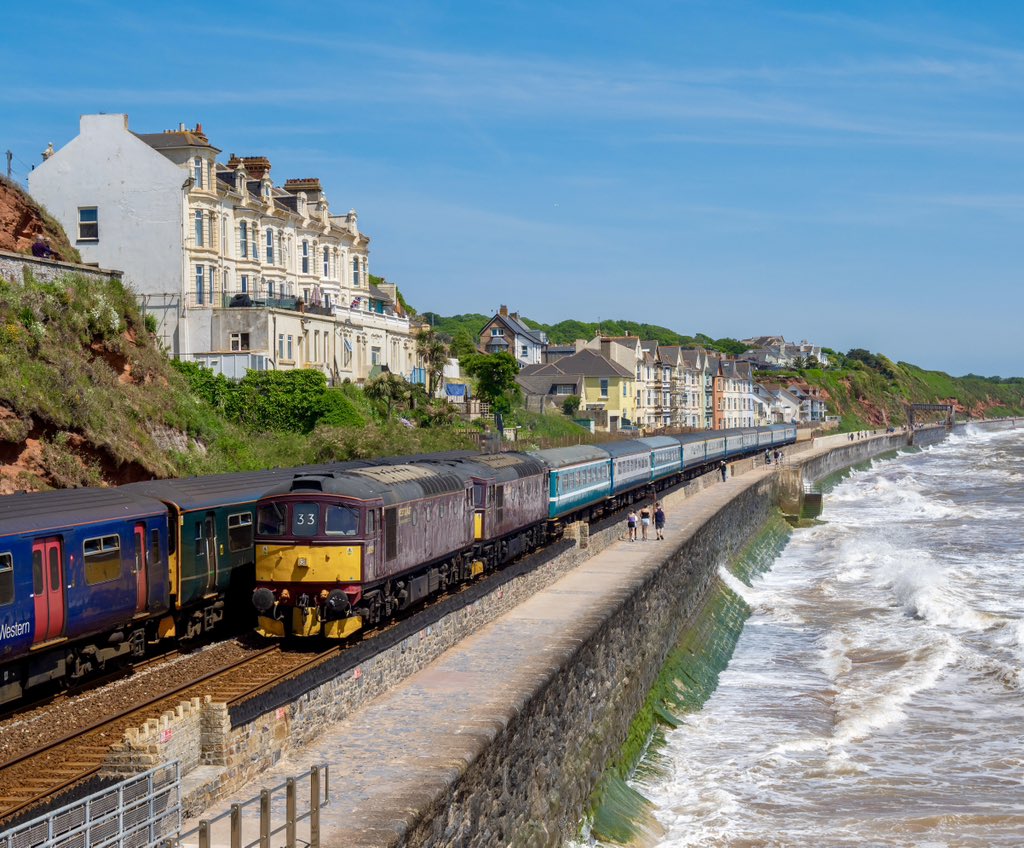 33029 33025 head past the wild surf along the Dawlish sea wall with Pathfinders Burton to Paignton Crompton Torbay Venturer. 29th May 2023. 📸 ☀️

⭐️ Print Store ➡️🏞🚂 etsy.com/uk/shop/Railwa…