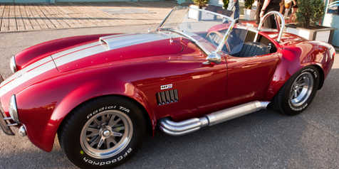 Shelby Cobra
The AC Cobra was a British sports car that was designed and built in the 1960s. American auto racer Carroll Shelby wrote a letter AC Cars and requested a car modified to accept an V8 engine, a move that set the way for the AC Shelby Cobra.