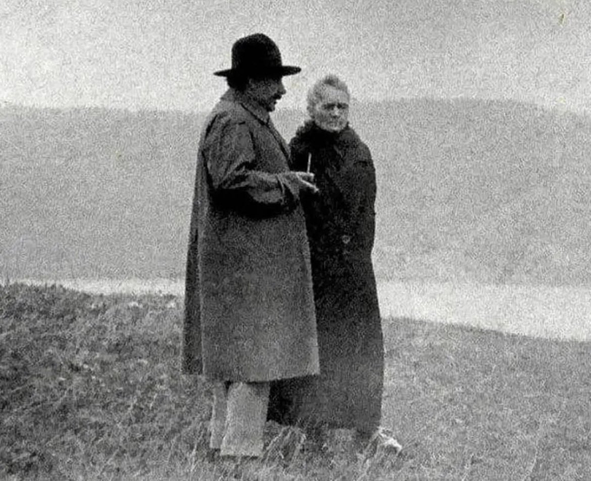historyinmemes's tweet photo. In 1929, a serene lake served as the backdrop for a heartfelt encounter between Albert Einstein and Marie Sktodowska Curie. Casting their minds back to 1906, Curie had endured the tragic loss of her husband, Pierre, who tragically perished in a collision with a horse-drawn cart while crossing a bustling Parisian street. Grieving for several years, Curie eventually discovered solace in the arms of Pierre's protege, Paul Langevin, a married physics professor estranged from his physically abusive wife.

Tensions escalated when Langevin's spouse uncovered his involvement with Curie. Determined to tarnish Curie's reputation, she orchestrated a break-in at their apartment, seizing their intimate correspondence and promptly leaking it to the media. Curie found herself unjustly vilified, with an angry mob even gathering outside her home. Seeking refuge and safety, Curie and her daughter sought shelter with a trusted family friend, hiding from the public eye.

In a remarkable show of chivalry, Langevin challenged one of the editors responsible for the scandalous tabloid coverage to a duel, valiantly defending Curie's honor. The adversaries stood face to face, but no shots were fired, perhaps signaling the recognition of the futility of violence in such circumstances.

Amidst these tumultuous events, Albert Einstein penned a letter to Marie Curie, extending his unwavering support and expressing his solidarity during her trying times.

"Highly esteemed Mrs. Curie,

Do not laugh at me for writing you without having anything sensible to say. But I am so enraged by the base manner in which the public is presently daring to concern itself with you that I absolutely must give vent to this feeling. However, I am convinced that you consistently despise this rabble, whether it obsequiously lavishes respect on you or whether it attempts to satiate its lust for sensationalism! I am impelled to tell you how much I have come to admire your intellect, your drive, and your honesty, and that I consider myself lucky to have made your personal acquaintance in Brussels. Anyone who does not number among these reptiles is certainly happy, now as before, that we have such personages among us as you, and Langevin too, real people with whom one feels privileged to be in contact. If the rabble continues to occupy itself with you, then simply don't read that hogwash, but rather leave it to the reptile for whom it has been fabricated. 

With most amicable regards to you, Langevin, and Perrin, yours very truly, A. Einstein"

In 1911, at the peak of the scandal, Curie went on to win her second Nobel Prize in Chemistry.