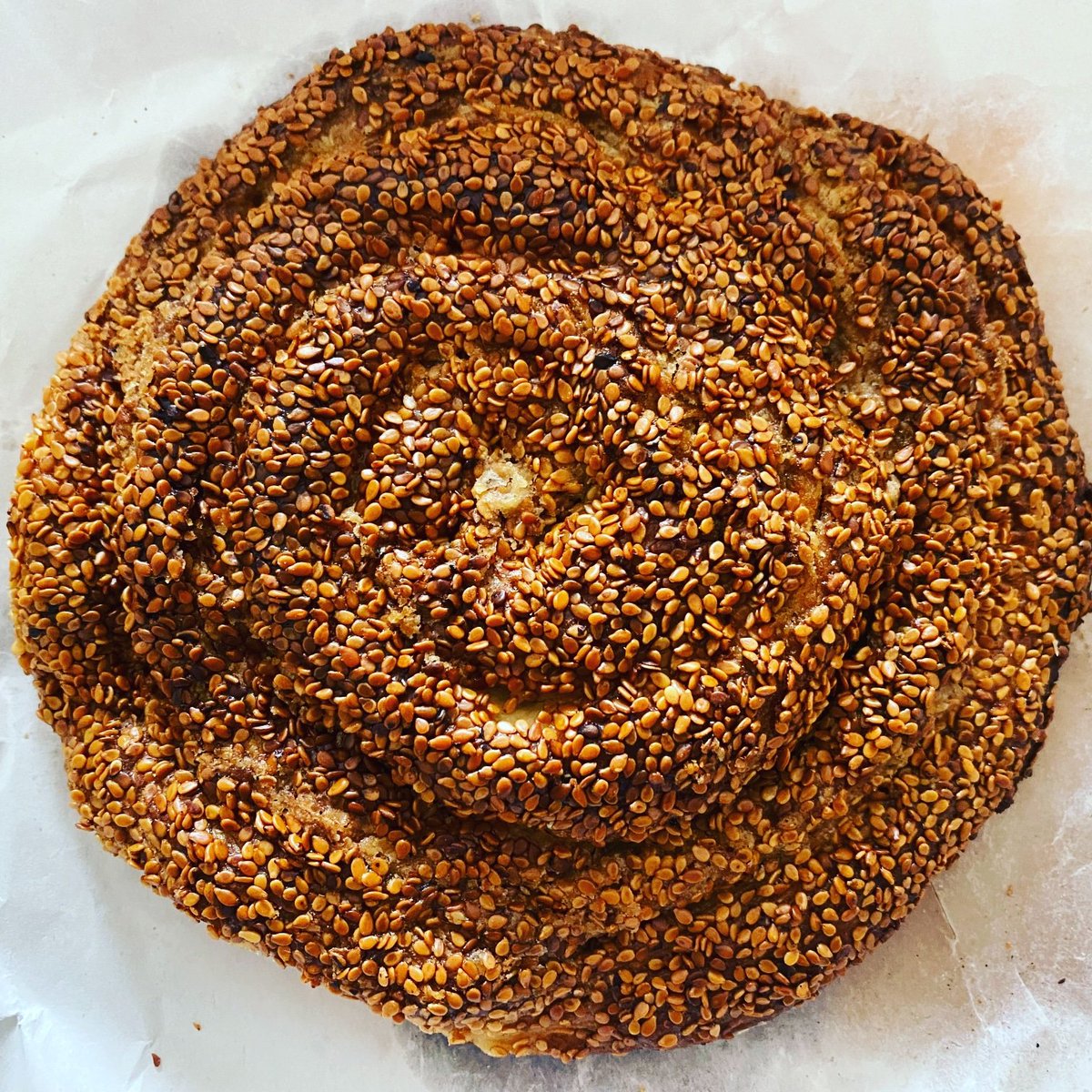 HeinrichHall1's tweet photo. Peter sent us this appetising picture. In his words: simple but delicious, a classic Turkish Tahini Ekmek. Laden with sesame seeds, with a crunchy exterior and chewy interior, it's woven with a slightly sweet tahini paste. 

For such delights, check out our tours in Turkey! https://t.co/rYXSTYxEl0