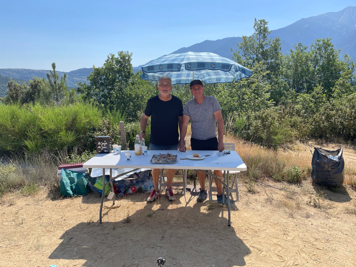 Only two weeks until our village VTT/MTB ride day. We had 150 riders from around the region last year. The whole place turns out to help. Here's one of the food stops - and yes, there was wine available. It IS France after all... :-)