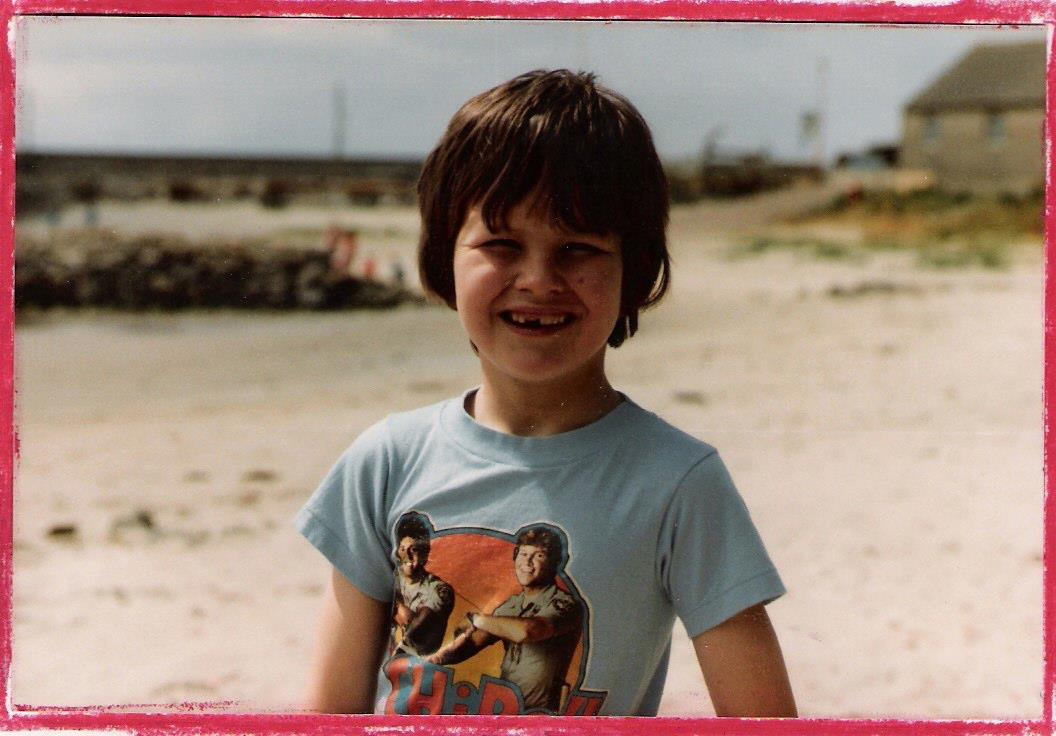In Kilmore Quay, Wexford circa 1980. Gotta love the CHiPs t-shirt.