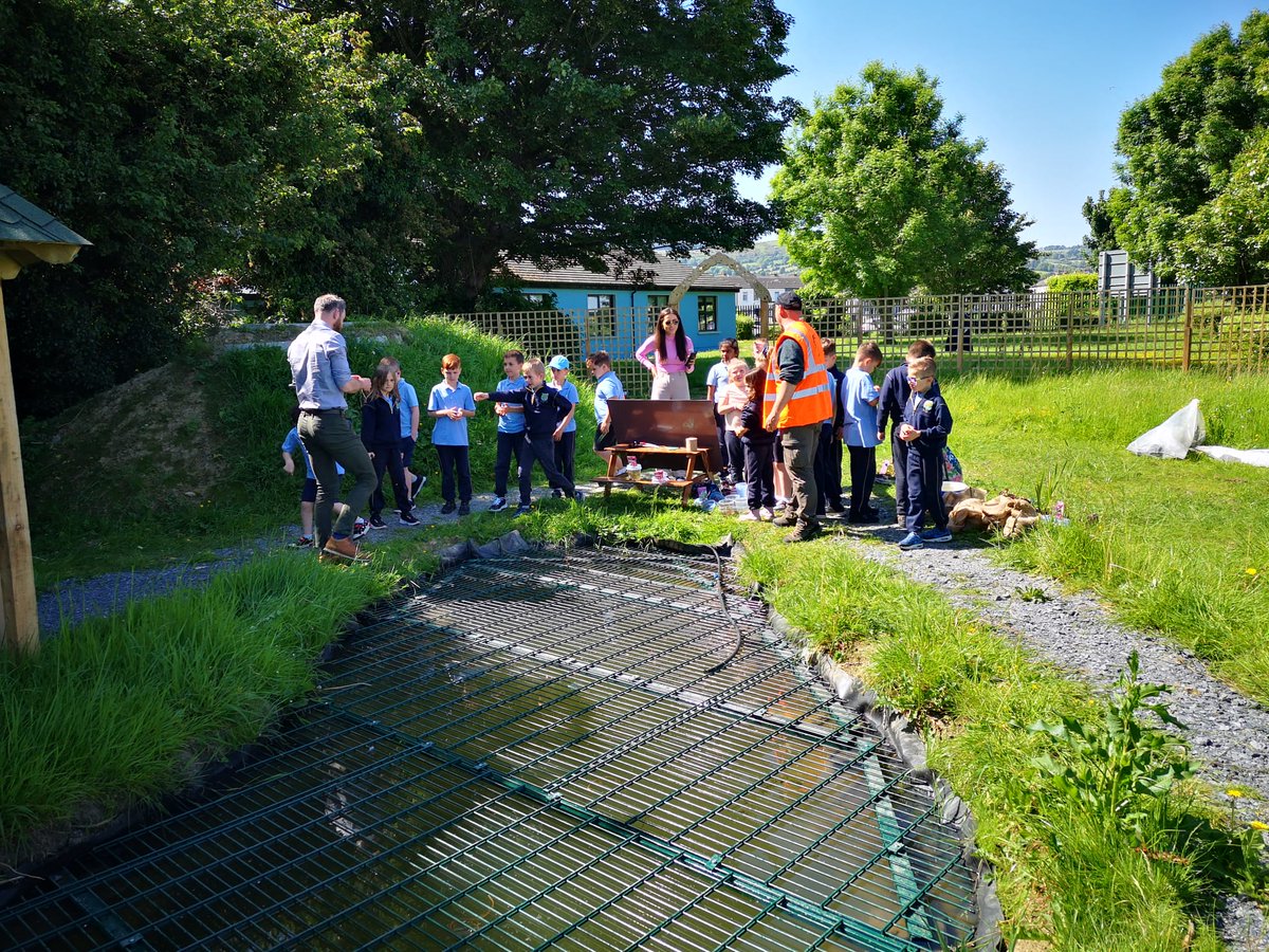 We were very excited to be planting our pond today with Rob Gandola from @HerpSocIreland and John Kiberd from @litter_mugs . We can't wait to see our pond develop and mature during the summer. Our @AnTaisce poster will give all visitors the information they need ! @cnsireland