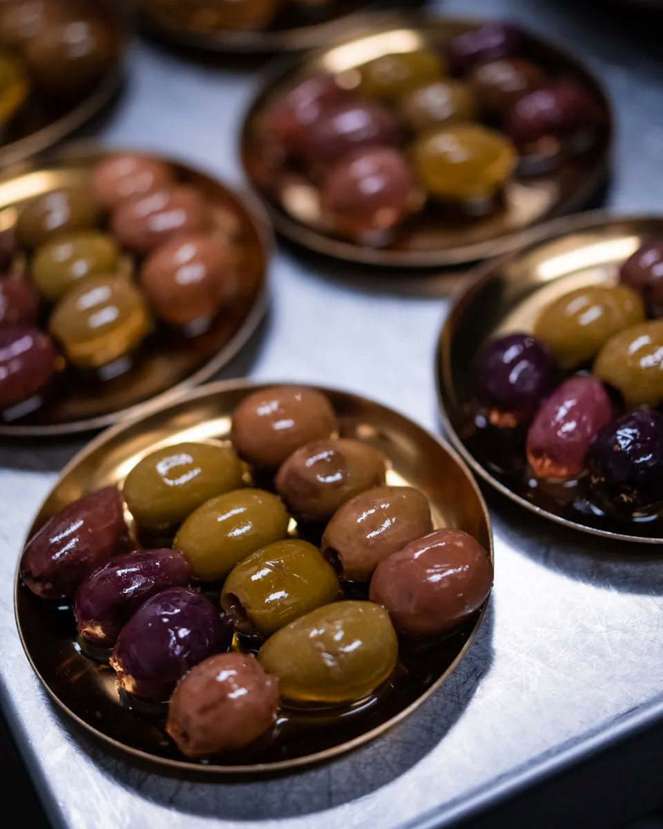 An escape to Spain for the evening wouldn't be complete without a beautiful plate of olives. Our signature olives have long been a menu staple, house-marinated with orange peel, thyme, and garlic to bring out the flavors and textures of this favorite. 🫒 buff.ly/3ce4DW5