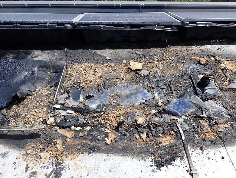 LondonFire's tweet photo. Four solar panels on the roof of a residential block were damaged by fire in #KilburnPark. PVStop, a black liquid polymer coating, was used to help crews bring the fire under control https://t.co/ptjd11Aatq https://t.co/eTvxZOCB9S