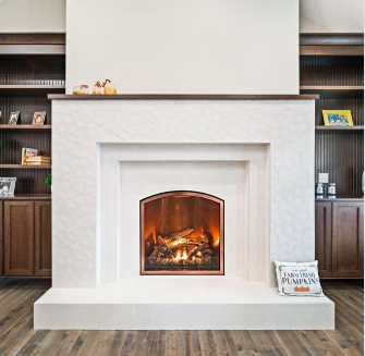 Fireplaces make living rooms feel cozy and inviting. Get more inspiration at holidaykitchens.com/quality-design…
