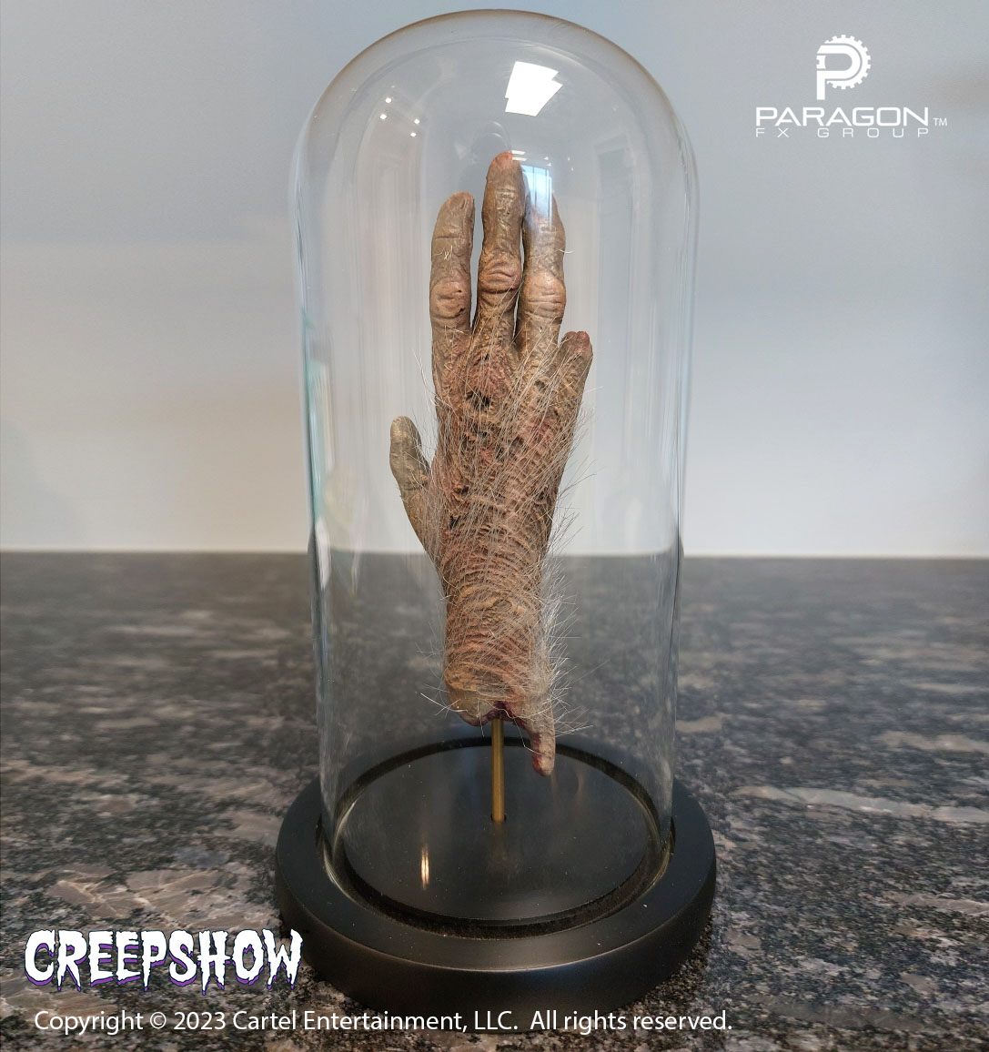paragonfxgroup's tweet photo. Excellent display solution for a very creepy prop! All you need is a bell jar and one of our Cursed Monkey Paw replicas! Paw available on our site (https://t.co/scW5d6jI7H) #cursedpaw #creepshow #cryptozoology #cursedcollectible #sideshowgaff https://t.co/G11sxOylRs