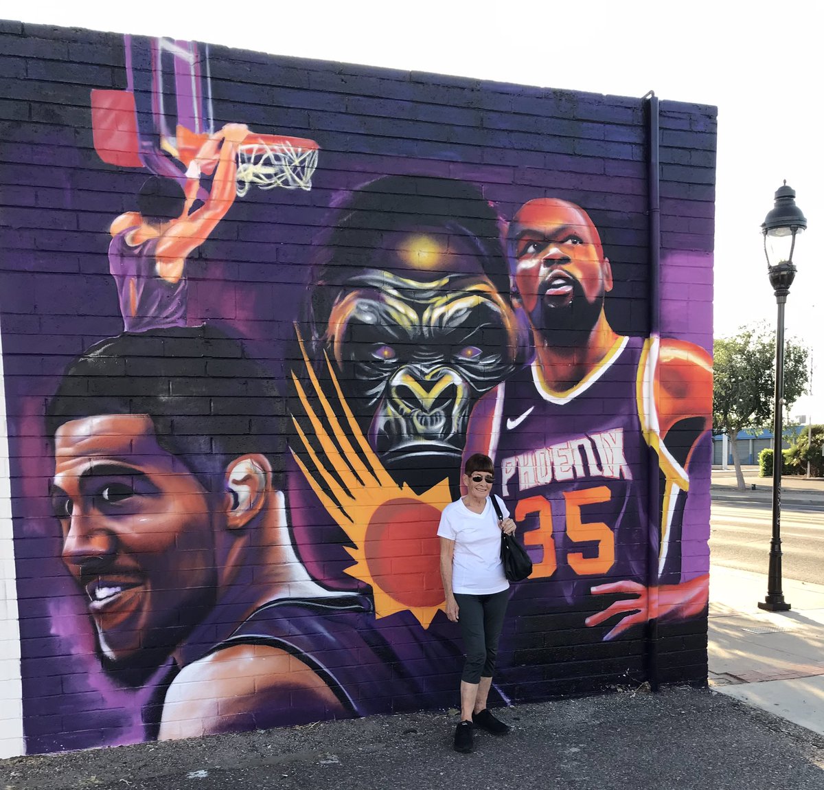 jsodowsky's tweet image. Phoenix Suns fans might want to take a trip to Glendale to see this awesome spray paint mural created by Juan Morales. It’s located at 5549 W Glendale Ave on the east wall of Chrispy Cutters, a haircut establishment. 🔥🏀🔥