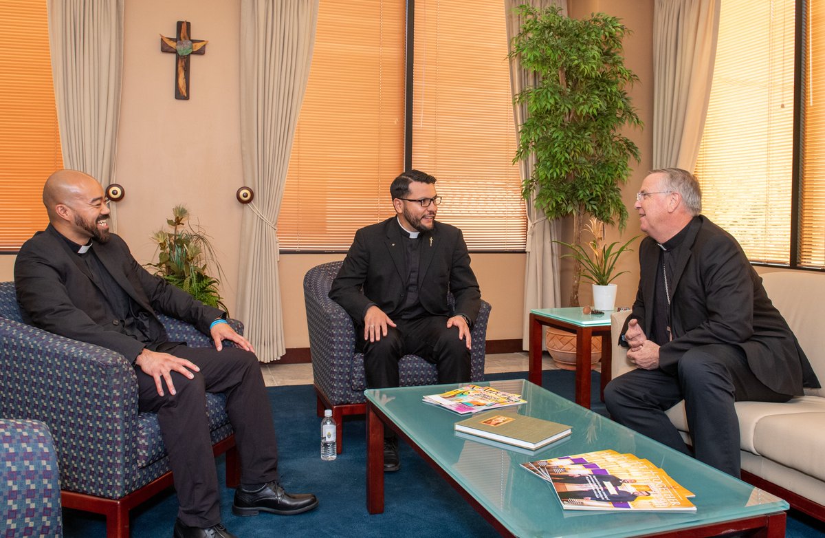 PhoenixDiocese's tweet photo. As we approach #PhxOrdinations, Bishop Dolan met with the two men who will be ordained on Saturday, June 3, at @SSJCathedral. All are welcome at the ordination of Miguel Solis and Gabriel Sabado, and it will be streamed live on YouTube and Facebook.
#PhxSems #DPHX https://t.co/yZpPc4J8bB