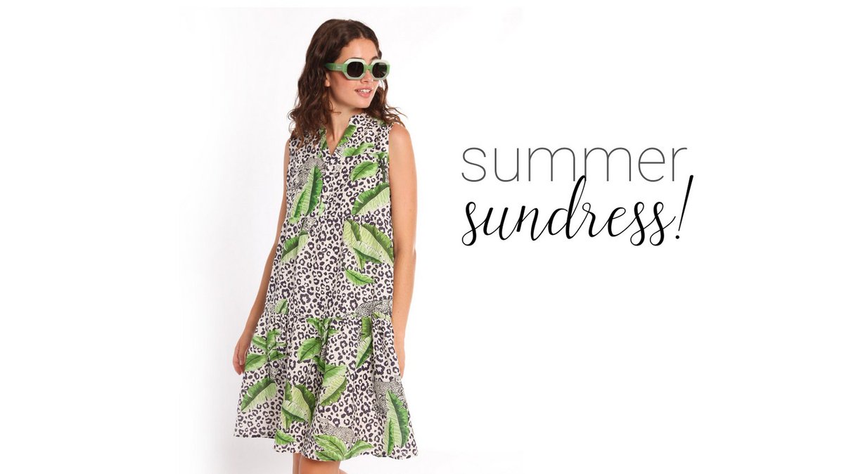 Cool off in this airy linen sundress!  The animal and plant print buttons down the front, with a lower ruffle along hemline. The fit is easy breezy! #summerfashion #resortwear #womens #linendress #delraybeach #bocaraton #palmbeach #dresses #longdress #rehearsaldinner #fashionblog