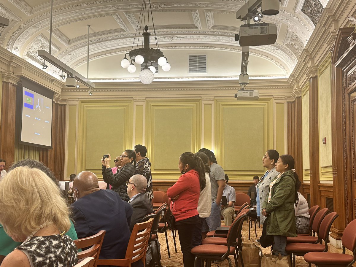 ScottGoldstein's tweet image. Excluded workers stand in the council chambers as the council votes on whether they commit to using any excess revenue that comes in to support an increase in SNAP benefits and the $20M that was brutally swiped from excluded workers. #NoMeExcluyas