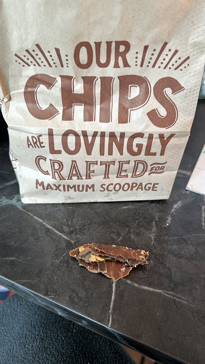 LukeLukefishr's tweet photo. I found this in my Chipotle chips what the hell lmao https://t.co/6OpIvstBU9