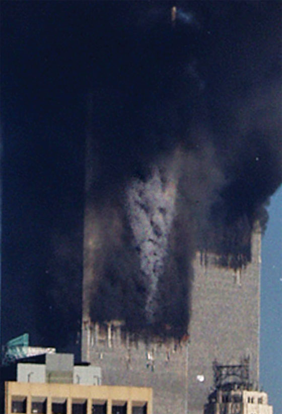 Remember when the smoke on South Tower (of the Twin Towers) formed what appeared to be a rather ominous sign.  

Many referred to it as the 'Devil's Face' at the time. 

That wasn't cool.
And we aren't gonna let it go either.