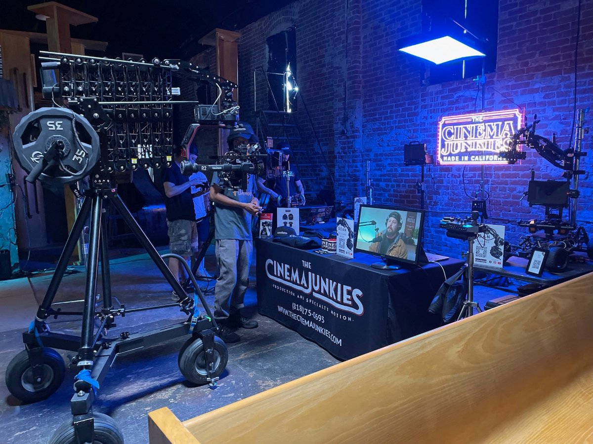 Our setup at @warehouseworkshops event. 

#warehouseworkshops #workshop #film #event #cinematography #crane #camera #ledsign #led #neonsign #booth #setup #merch #monitor