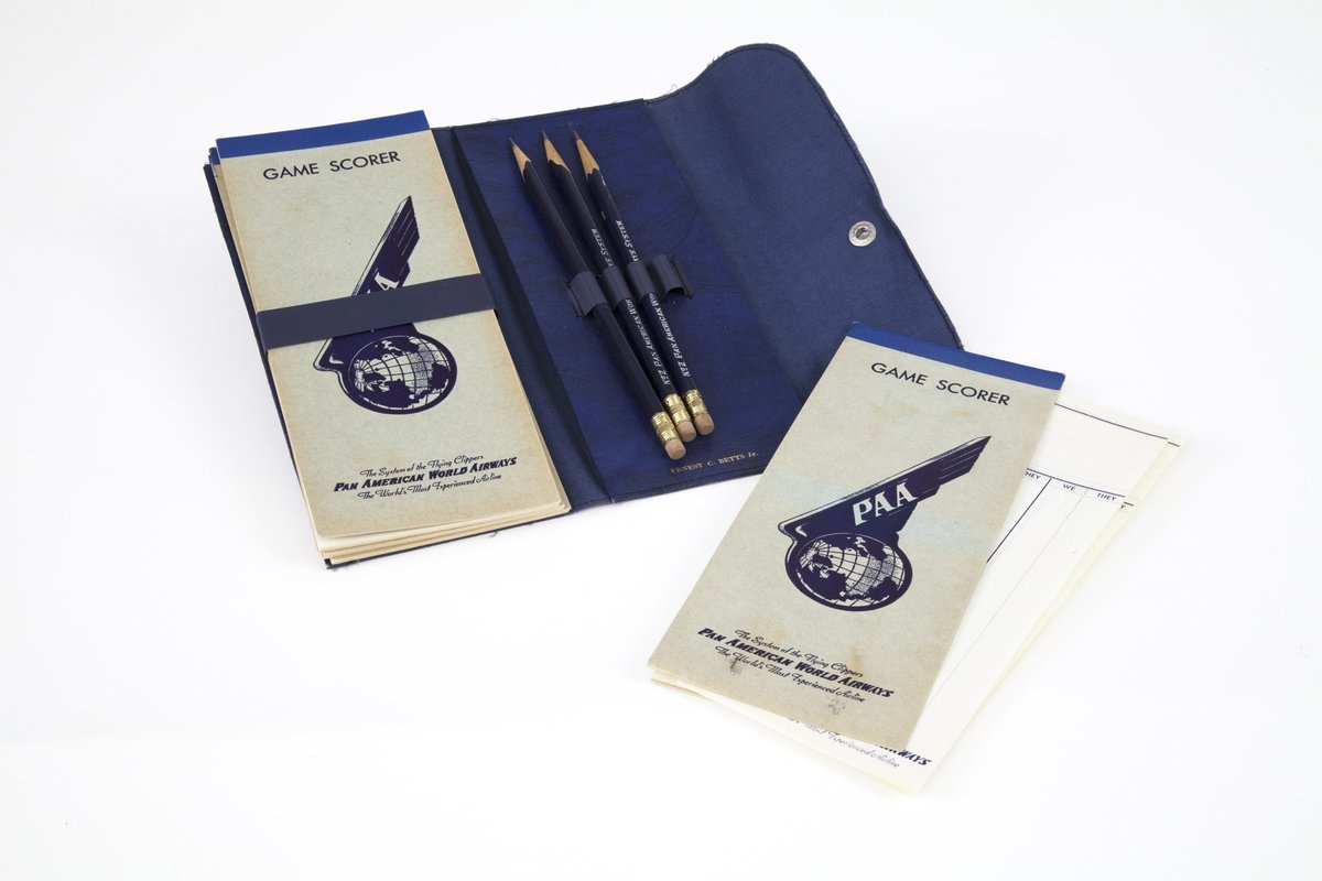SFOMuseum's tweet photo. Before the age of cell phones and seat-back entertainment systems, in-flight entertainment was generally low tech and relied on games. This 1940s gamer scorer from #PanAm could be used to keep track of a variety of games with columns for "we" & "they" on interior pages #52Objects https://t.co/tNT80D8RUE