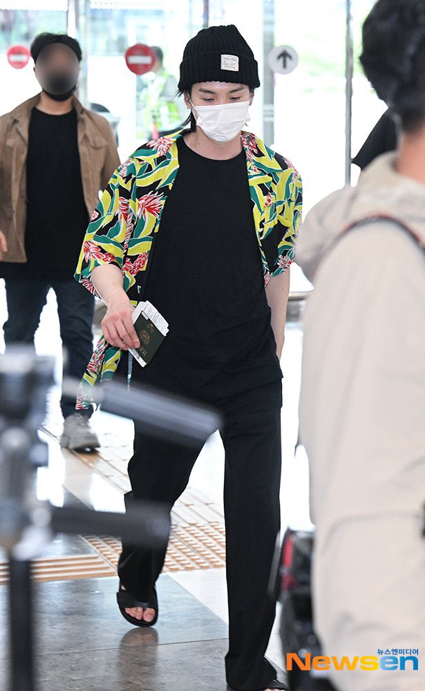 V, Suga of BTS are seen leaving Incheon International Airport on