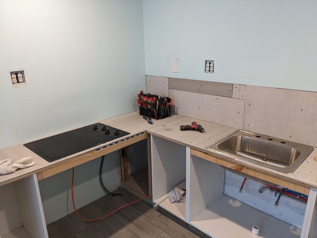 I got the sink and cooktop stove fitted.  Next stop, granite tile countertops.  #kitchenonabudget