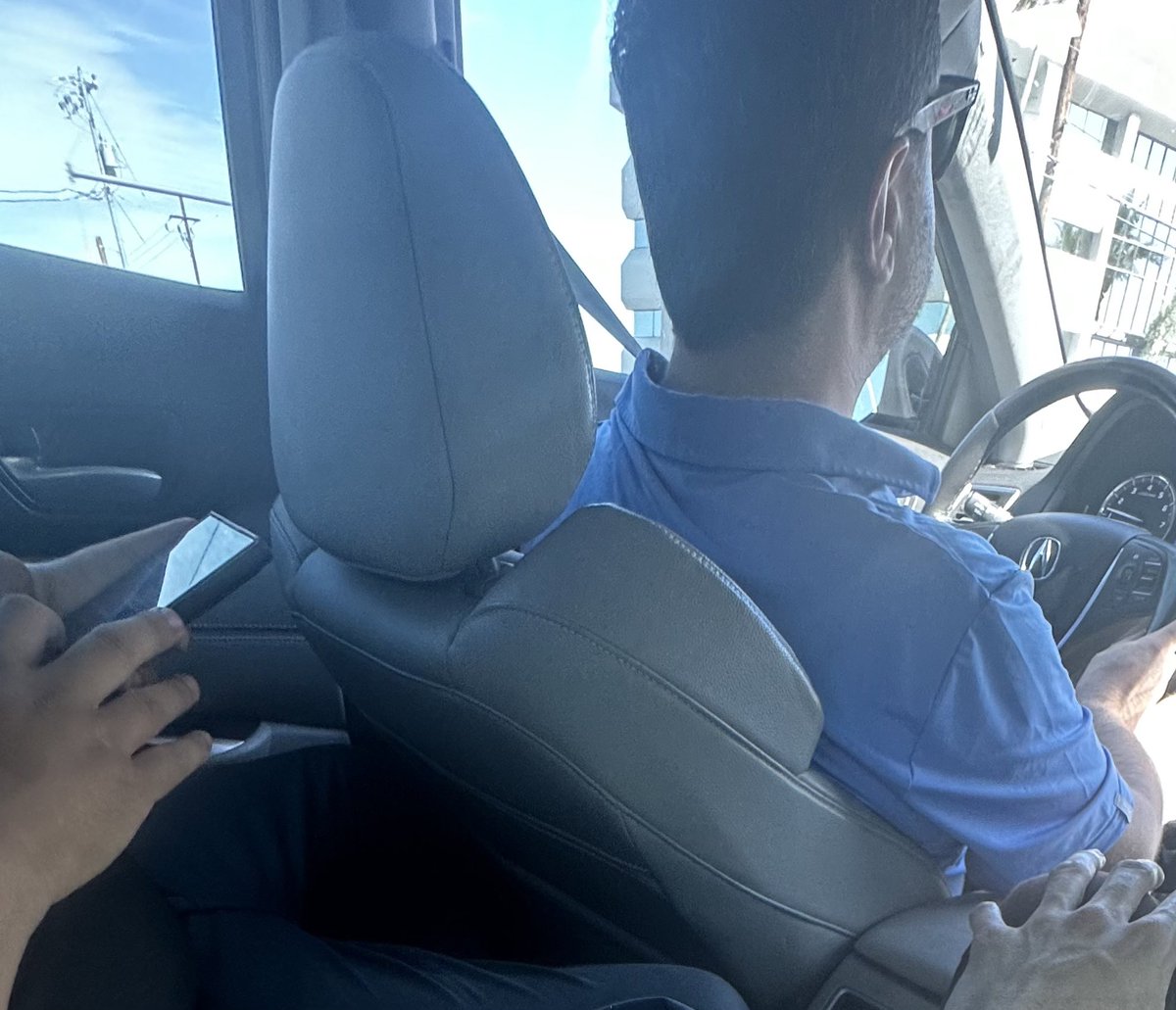 my friend ripped his pants in this Lyft because this driver wouldn’t move his seat up