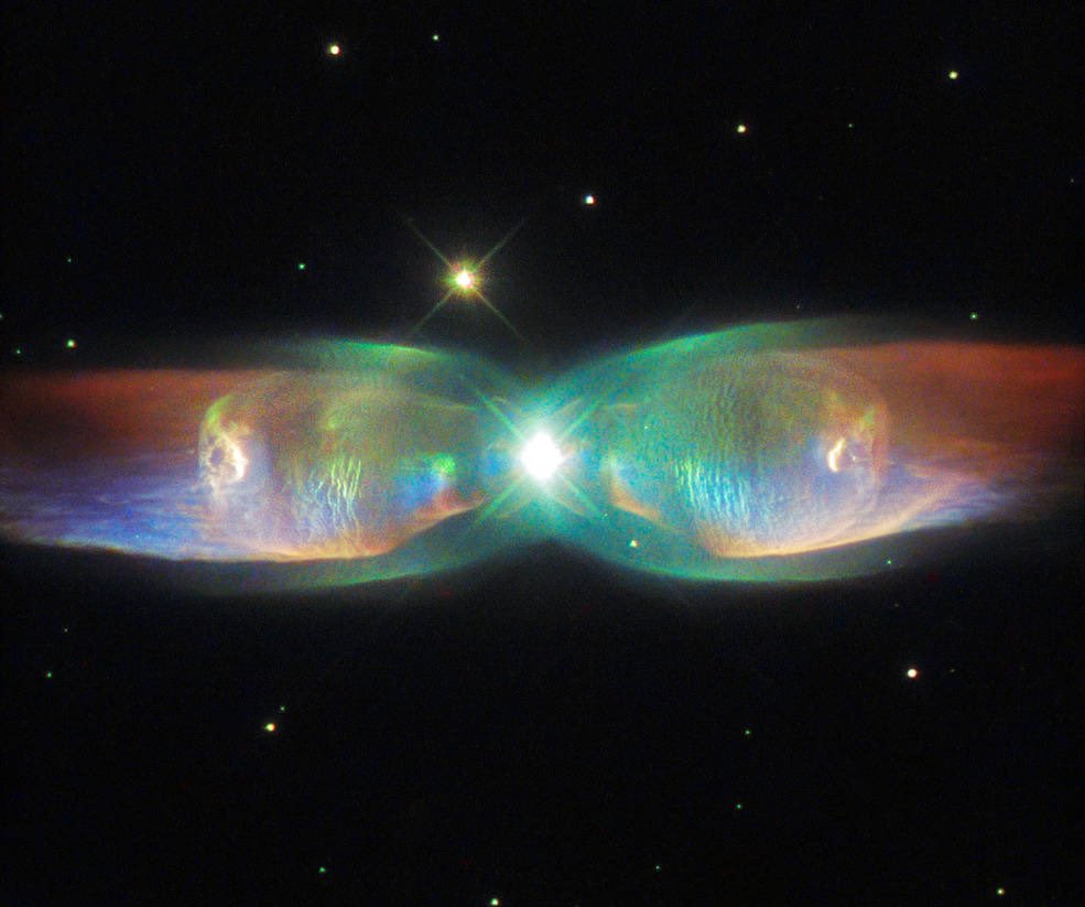 BangtaNASAverse's tweet photo. 🥺 Take Two is coming.🥺
Here is the Twin Jet Nebula. It’s a bipolar nebula with TWO stars in the center. It “takes two” of these stars dancing around each other pulling on the the gas to form the shape of WINGS of a BUTTERFLY. 🦋-👽

#BTS10thAnniversary #2023BTSFESTA #BTStaketwo https://t.co/XviewnXMaf