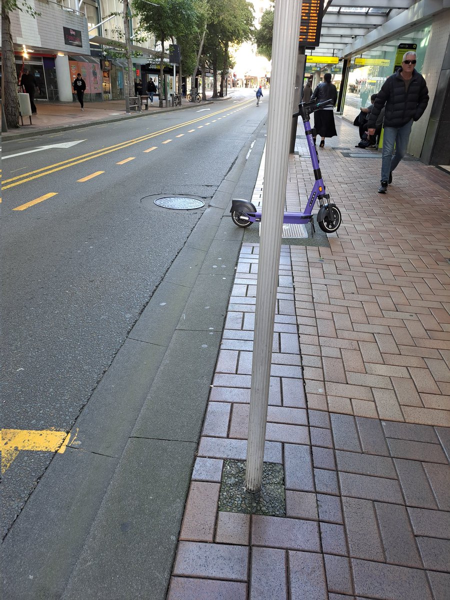 Windynell's tweet photo. 'Not just pedestrians ' imagine trying to get on or off the #bus with escooters parked in the busy bus stop. Are there any councillors who care? @DaranPonter @nashthomas Not convinced #LGWM has any solution to fix this https://t.co/7urs2Nbvip