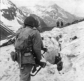 May 31, 1943: On island of Attu in the Aleutians, soldiers of the US Army’s 7th Division root out last Japanese stragglers