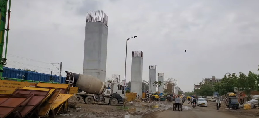 Pillar Cap, Pillar casting work on Going in Pkg C7 of MAHSR for 18.133 km lenght. Few Pillars are fully casted with pillar cap.

Span by Span (SBS) Launching technique will be used in entire Ahmedabad City. One more launcher has been arrived from IRCON – DRA JV.

©️One More Train