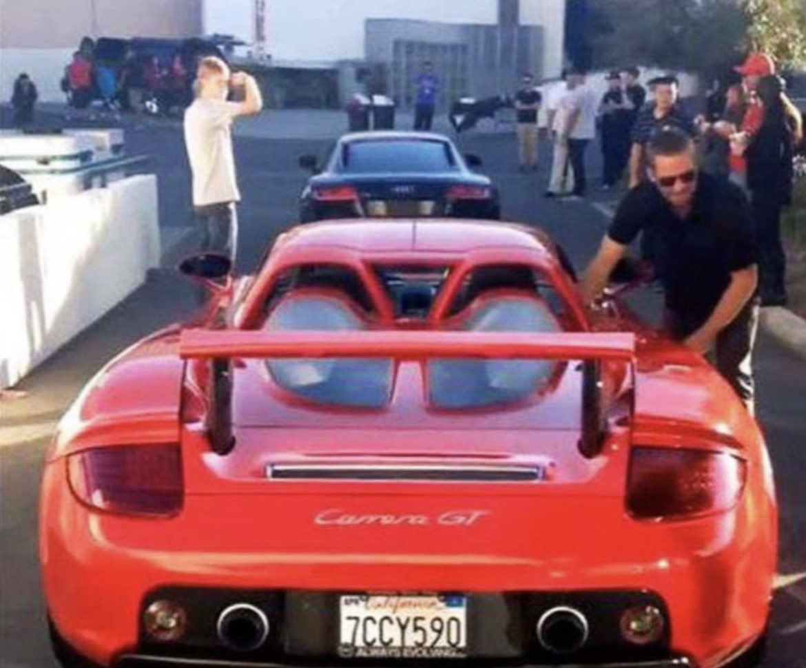 Paul Walker getting into the car that just moments later would hit a tree and explode into flames.