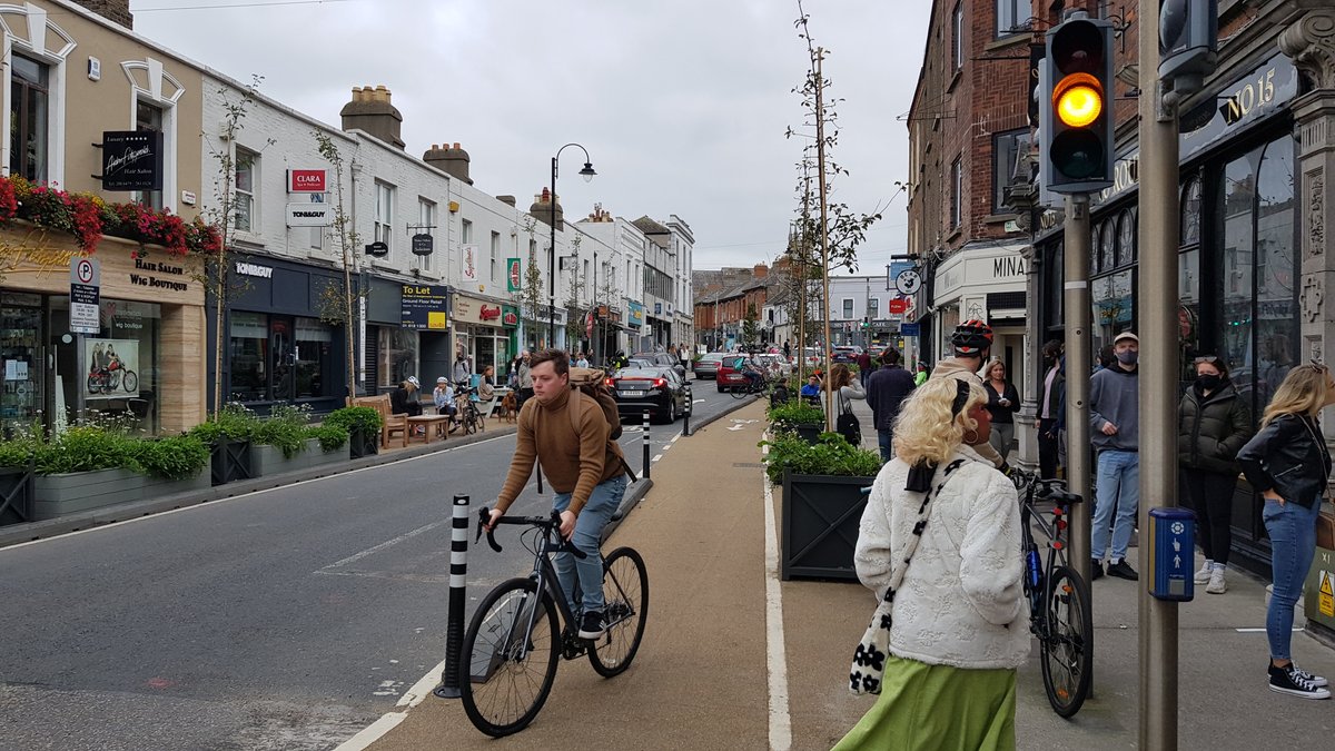 JTUrbanDesign's tweet photo. @Archidub1 Have you been recently?  The village has been transformed  with a new one way system and much of carriageway/parking transferred over to seating, space for pedestrians/cyclists and landscaping (all proposed to be upgraded and made permanent). https://t.co/7YsepwfC6F