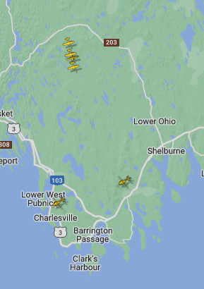 Three planes reading 'Forest Protection' headed from Fredericton to the Shelburne fire:
