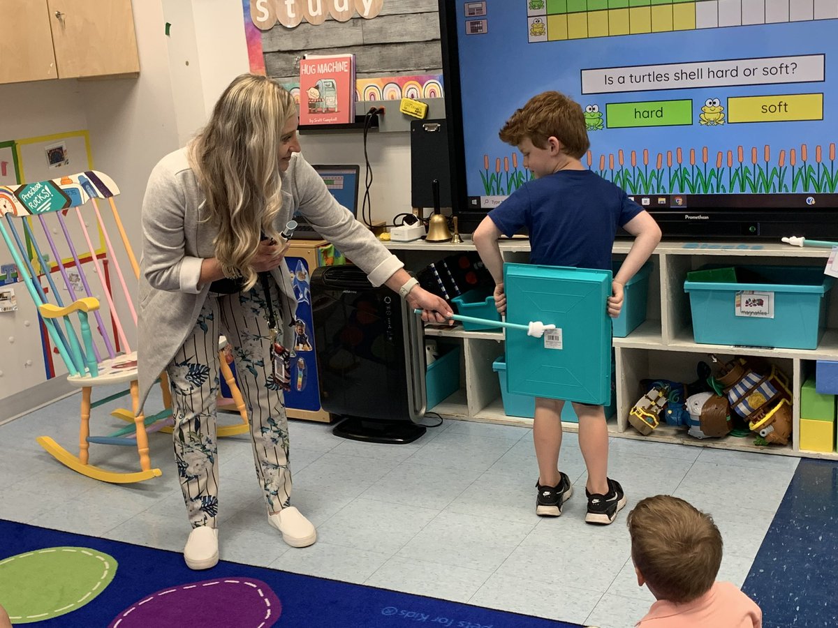 slevin_prek's tweet photo. Question of the day: Do turtles have hard or soft shells? We used a tray to act as a shell for the answer! Our shell protected us from the pointer which made us all giggle! #fhleads #sandstudy https://t.co/mIvE0dQRgc
