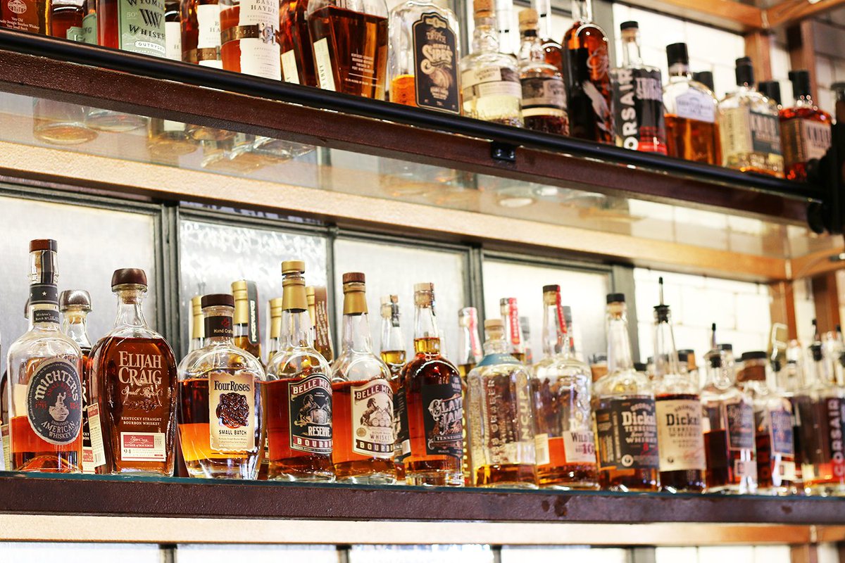 Whiskey Wednesday! Stop in and enjoy a drink from our whiksey wall!