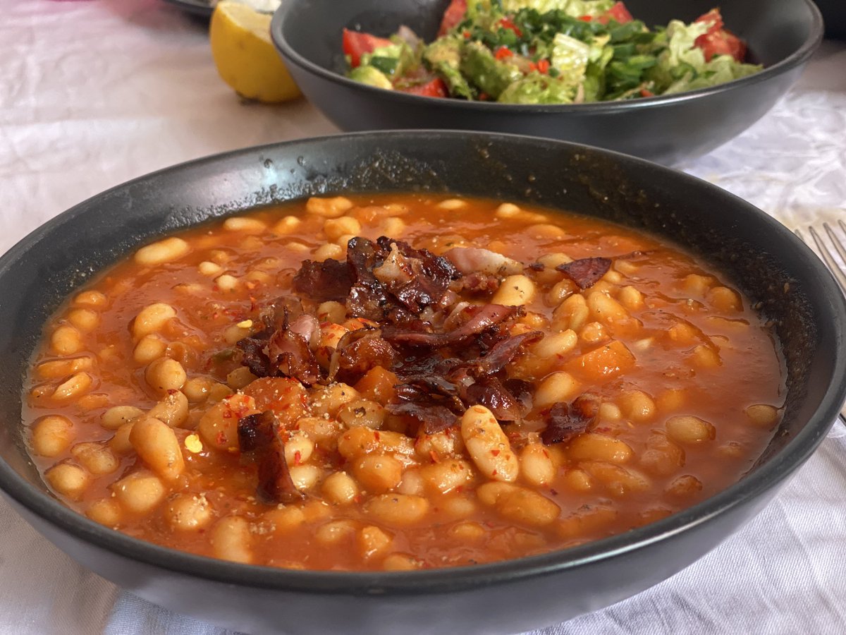 My wife’s bean soup topped with crunchy bacon and an avocado salad with some chilies on the side