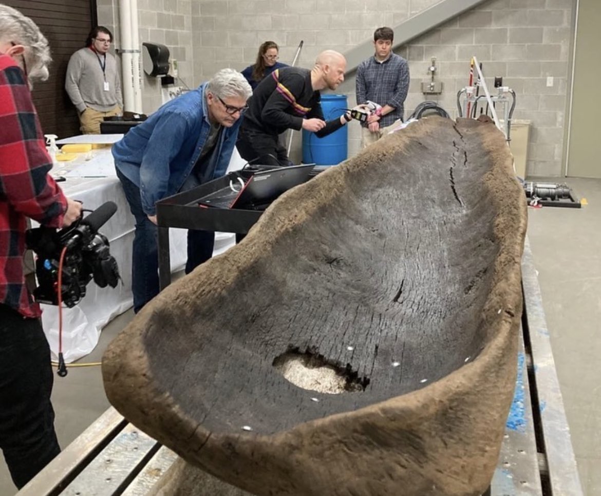 historyinmemes's tweet photo. A dugout canoe measuring 15 feet in length was discovered in Wisconsin's Lake Mendota recently. Using advanced technology, experts have determined that the canoe dates back to approximately 1,200 years ago.

As the well-preserved canoe was retrieved from the lake, Wisconsin state archaeologist Jim Skibo remarked, "This is the first time this thing has been out of the water in 1,200 years.” The remarkable find was brought to the surface in November 2021 after being spotted by maritime archaeologist Tamara Thomsen, who was observing a school of fish at the lake's bottom.

Thomsen noticed a protruding log on the lakebed and upon closer inspection, identified it as a canoe. A wood sample was sent for carbon dating, revealing an astonishing result—the wood dated back to 800 A.D. Thomsen had discovered a 1,200-year-old canoe.

The canoe is believed to have belonged to ancestors of the Ho-Chunk Native Americans, who constructed dugout canoes by burning the inside of logs and shaping them with stone tools. "Consider cutting down a tree that's two-and-a-half feet wide with a stone tool and then hollowing it out and making it float," Skibo explained "It must have taken hundreds of hours and a great deal of skill."

The vessel will undergo several years of preservation treatment and may eventually find its place in a proposed Wisconsin Historical Society museum in Madison.

"Hopefully the canoe will play a role here," said Skibo. "It's a great artifact for telling multiple stories.