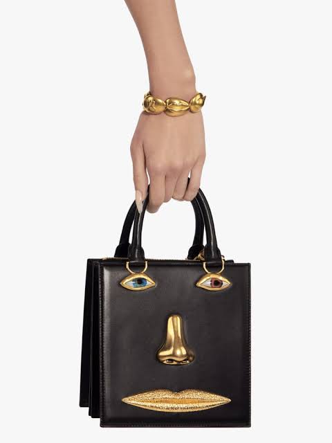 On the Schiaparelli website and I very much enjoy how the shopping bag is just one of their face bag and not a generic shopping cart icon. Maybe it's just a throwback to UI design classes but I just love it just like I love this bag😭