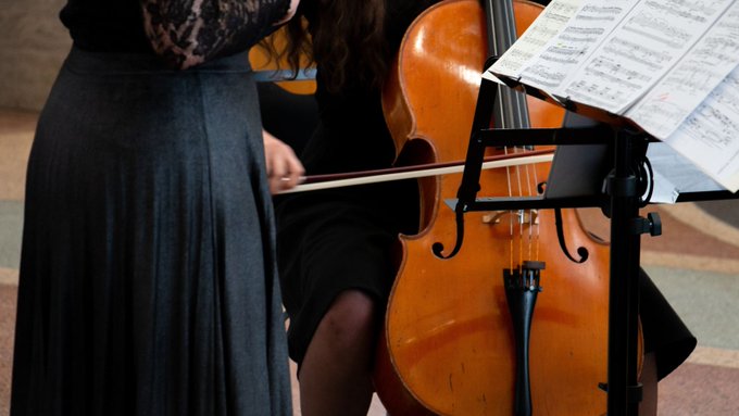 Photo of a Cello and a music stand.