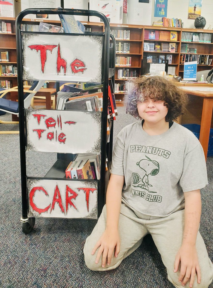 May Days in the <a href="/RBMS_Official/">River Bend M.S.</a> Library: AAPI Heritage &amp; Summer Reads, student artist book cart designs, and Spectrum project displays! 😎