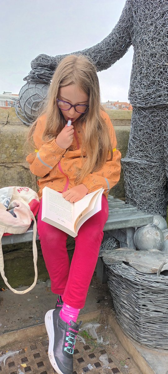 SarahJamkeys's tweet photo. Day 2 was reading with a sweet treat. Emily happily munched on a fudge while starting her new book, A Kind Of Spark. Have you got a copy of this in school @YsgolPenRhos? https://t.co/e2zqyee9g4