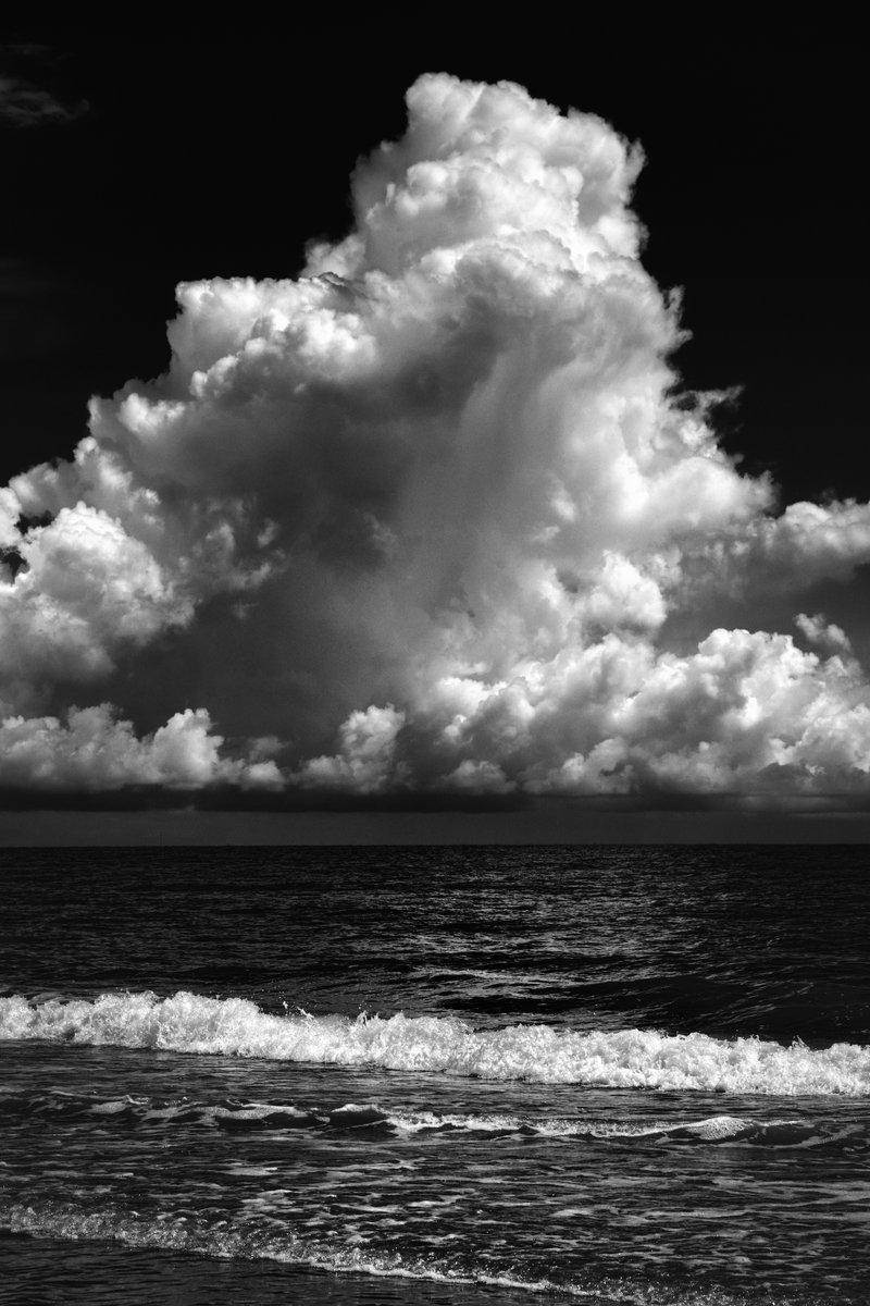 GM!
THE CLOUD OVER THE SEA

The cloud above the tranquil sea, drifts gracefully, wild and free.
Its misty tendrils dance and sway, painting dreams at the end of day. 

  #nftphotography #nftgallery #NFTs #NFTphotos #nftphoto #blackandwhitephotography #monochrome #PhotographyIsArt