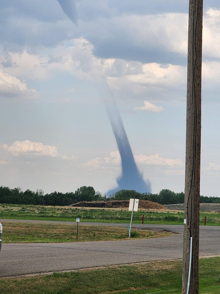 Landspout tornado on the ground near Donalda AB pic taken by Chris Tazier #abstorm