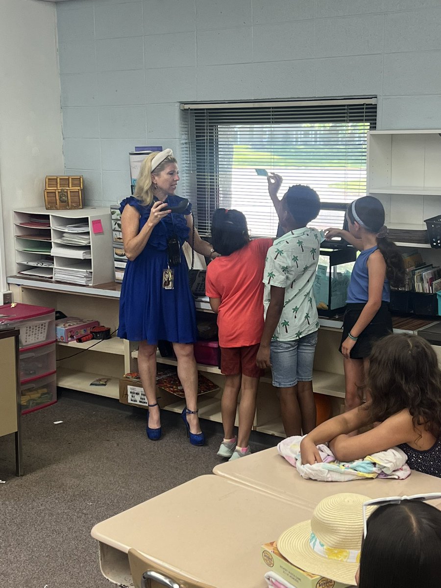 MrsKPersaud's tweet photo. 2P got to help with the morning announcements this morning along with a few paw draws! https://t.co/Du7AbZqCH2