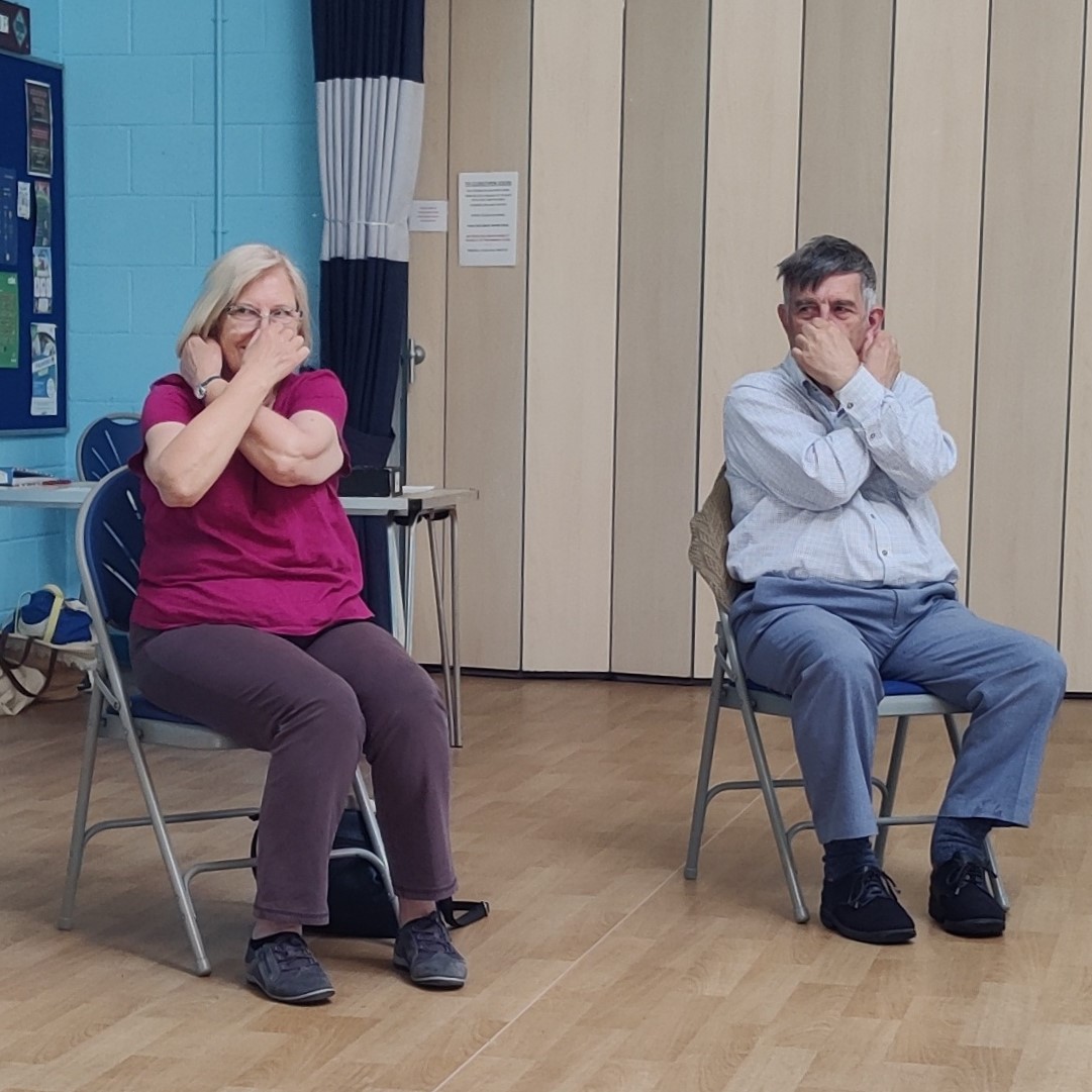 BeyondDementia_'s tweet photo. Fun at #Melksham #MovementfortheMind. To encourage using both sides of the brain, members had to hold their noses with one hand & the opposite earlobe with the other hand. Not as easy as it looks when you have to swap quickly! #dementiaactivities #dementia @WiltsHour @RRogersSEPM https://t.co/KIf5hHILaO