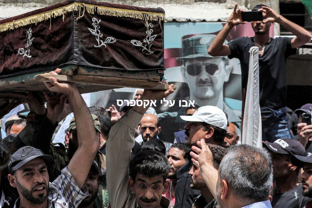 AbuAliEnglishB1's tweet photo. #Syria: Pictures from today's funeral of the five militants belonging to the #Popular_Front General Headquarters

The five were killed early yesterday morning on the Lebanese side of the border with Syria following the #explosion of an old rocket that was stored in the... (1/2) https://t.co/dMFI0pqKdm