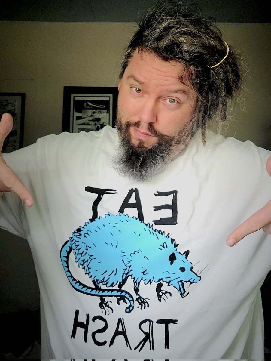 Mad_Dog_Tim's tweet photo. I may not be the sexiest choice to model @TheKyleStarks #EisnerNominated tshirt for I Hate This Place, but I am certainly the most likely to get you to eat trash. Bon Appétit. https://t.co/iqAuiAISCo